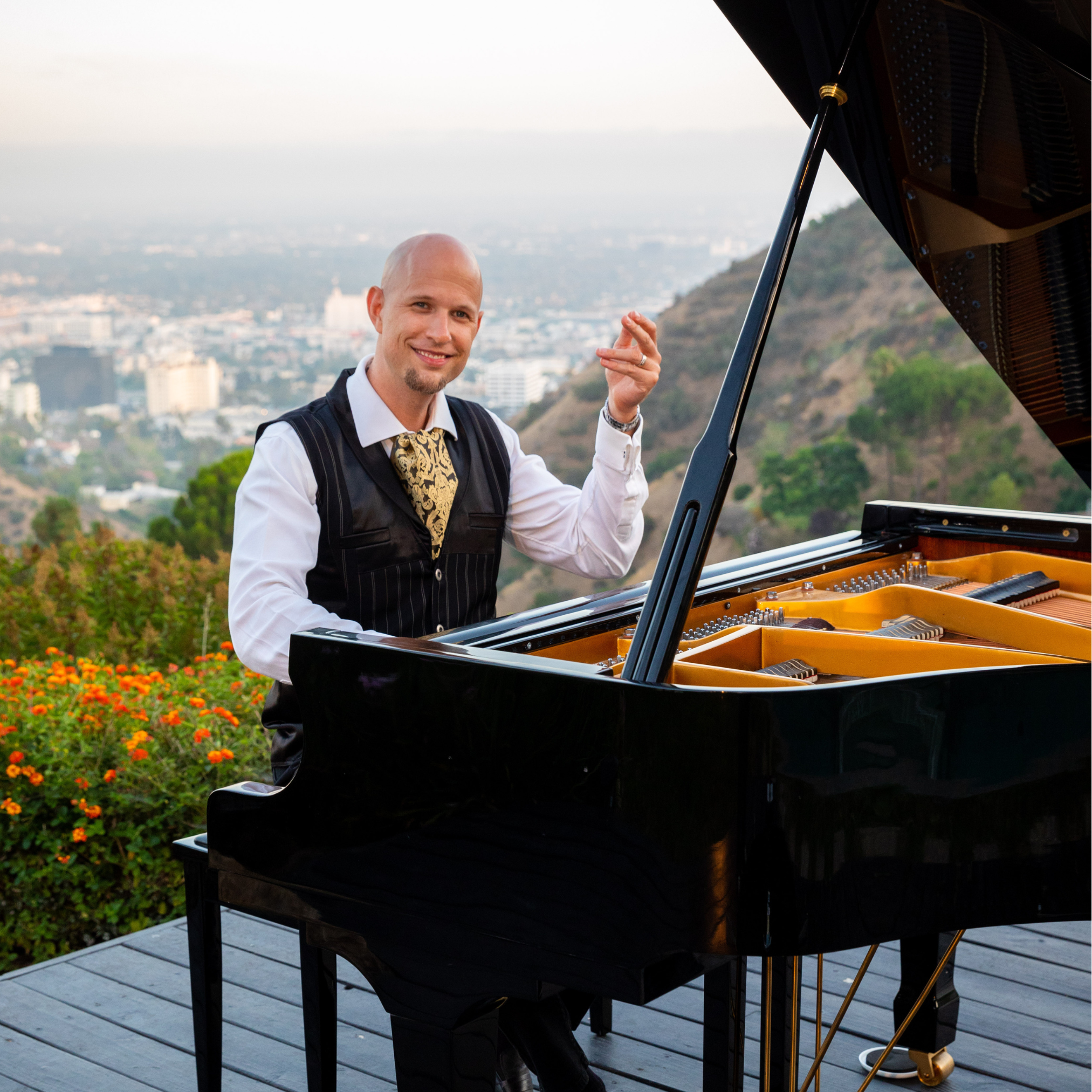 Image of Jeremy Weinglass with a piano.